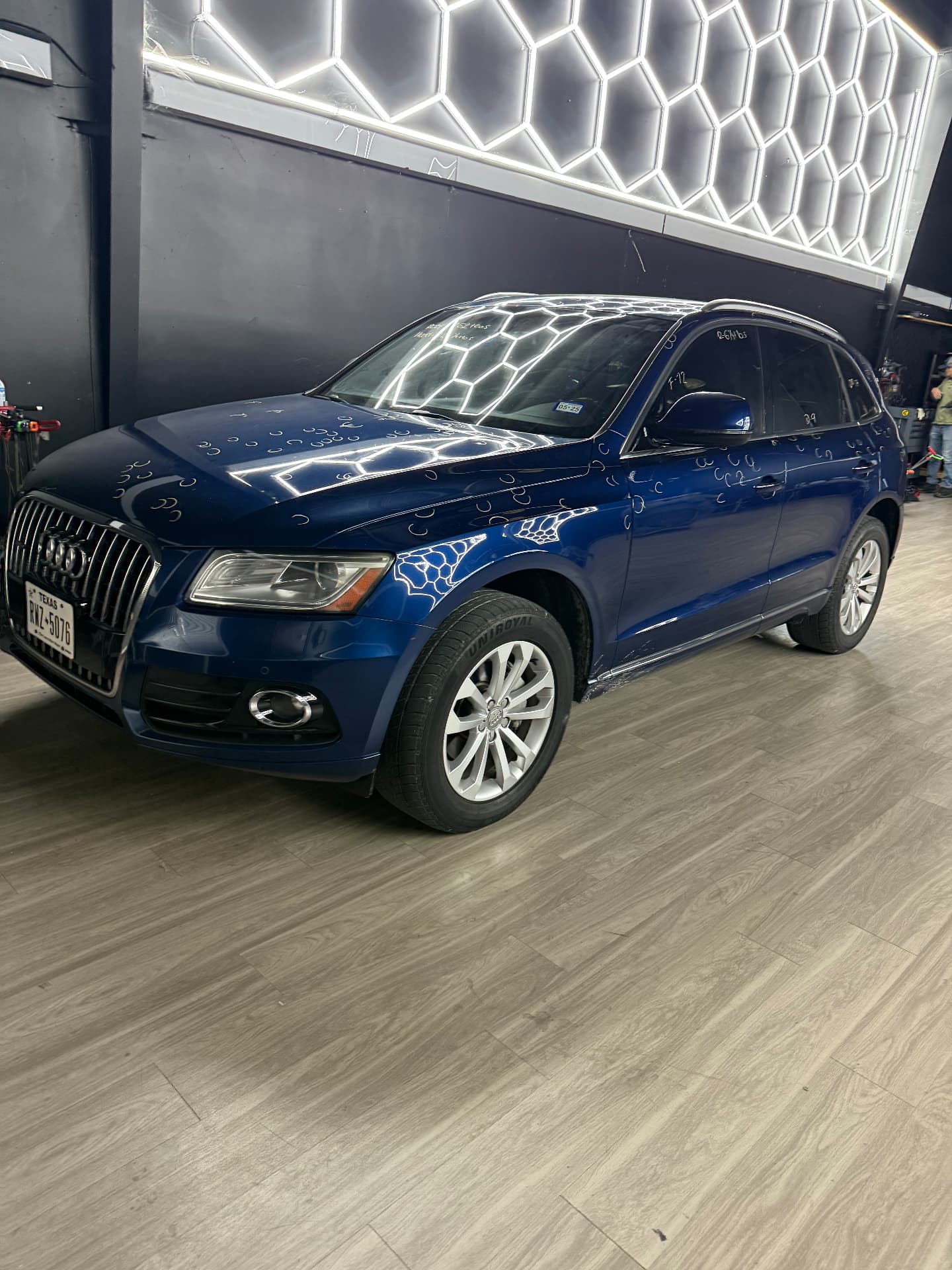 Clean detailed blue Audi SUV after PDR and post-repair detailing