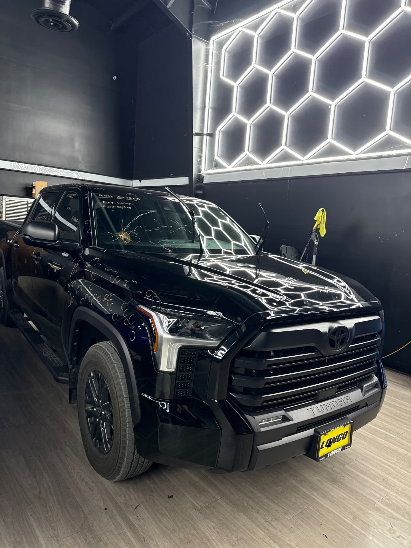 Clean detailed black Toyota Tundra after paintless dent repair